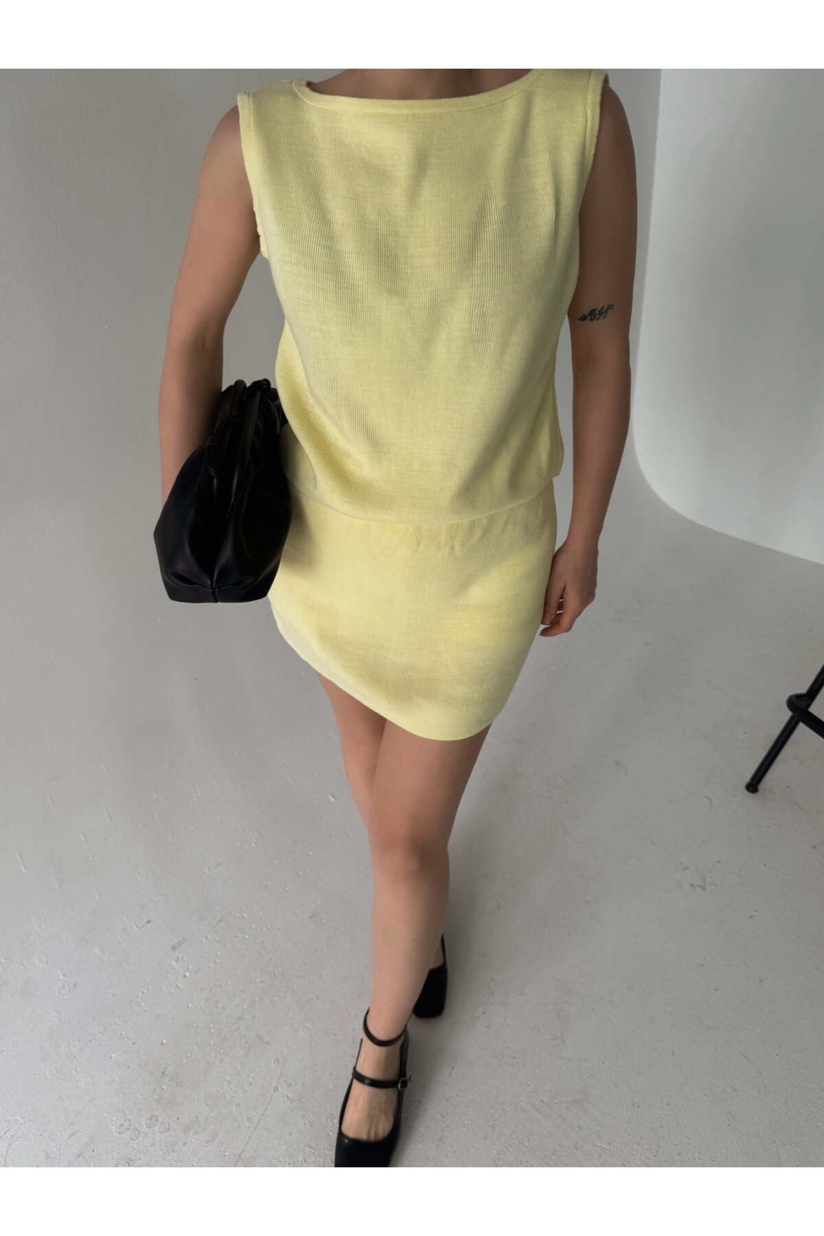 Kadın marka model limon sarısı triko şort etekli alt üst takım