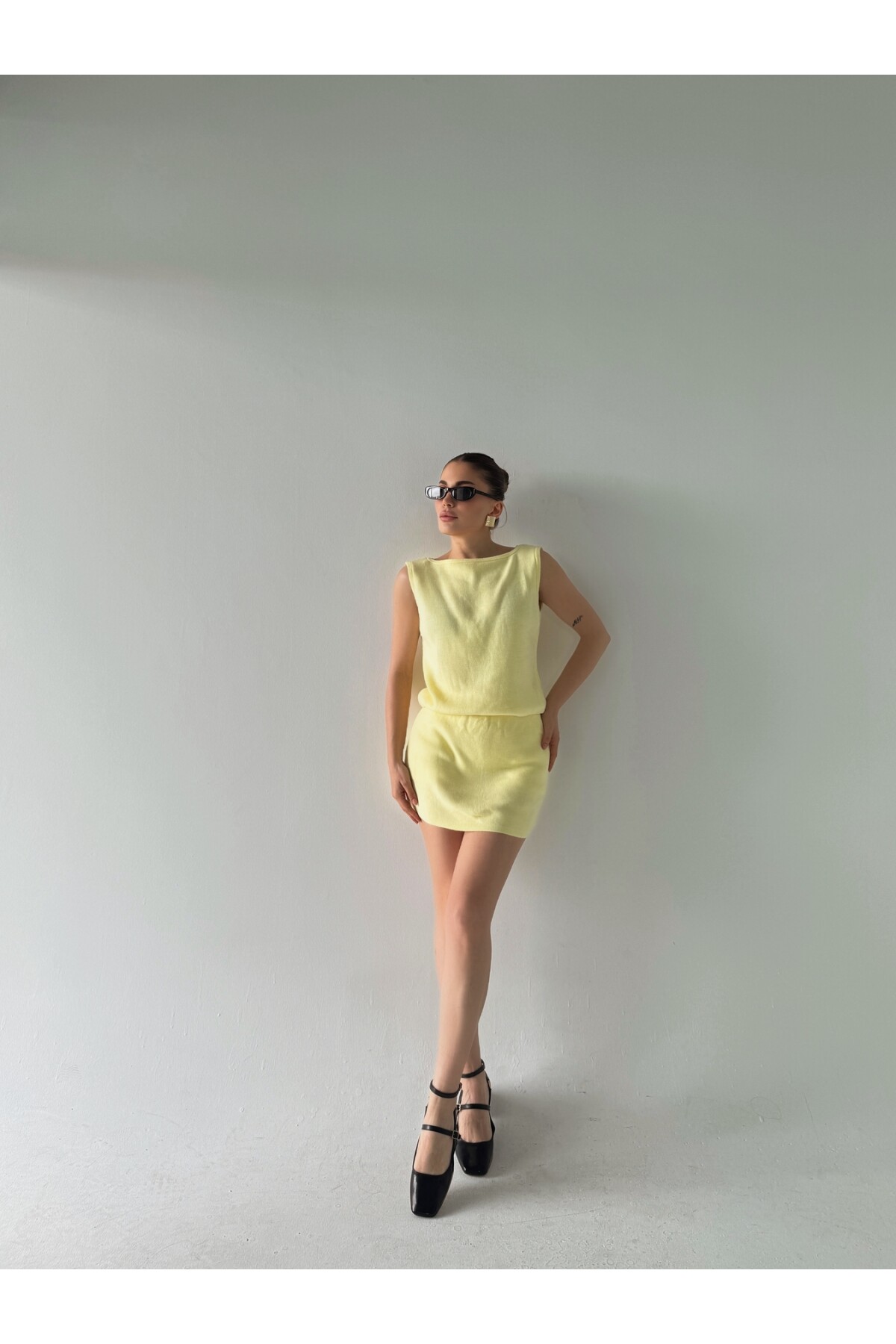 Kadın marka model limon sarısı triko şort etekli alt üst takım